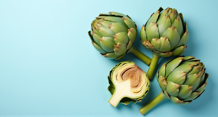 Fototapeta premium artichokes on a wooden background