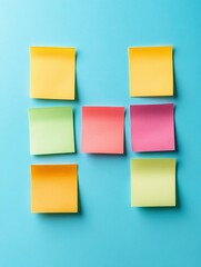 Fototapeta premium Colorful Sticky Notes on a Blue Background
