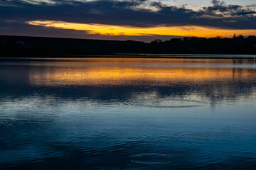 Ripples and Reflections at Sunset