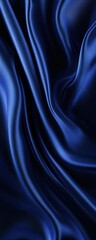 Obraz premium Elegant blue silk fabric with smooth, rich texture. Perfect for backgrounds, fashion, and design concepts.