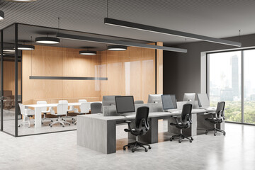 Office interior with coworking and glass meeting room, panoramic window