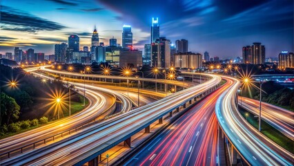 Obraz premium Highway lights illuminating cityscape with streaks of traffic at night, long exposure photography