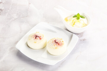 Curd pancakes with sour cream