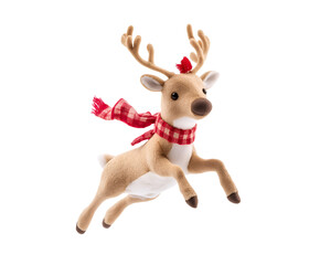 Fototapeta premium photo of a reindeer doll with a red scarf floating in mid-air on isolated background 