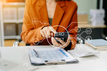 Zero trust security concept Person using computer and tablet with zero trust icon on virtual screen...
