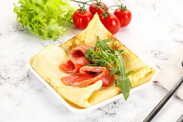 Russian pancake with salmon fish