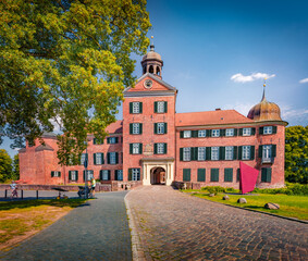 Colorful summer cityscape of Eutin Castle. Stunning morning cityscape of Eutin town, district capital of Eastern Holstein county, Germany, Europe. Traveling concept background..
