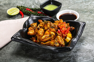 Vietnamese cuisine - fried frog with vegetables
