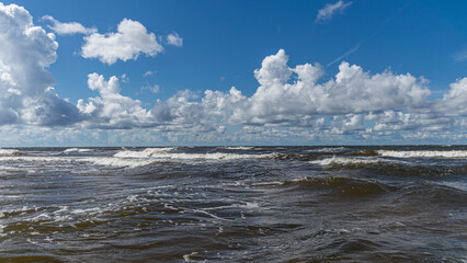 seascape, storm at sea, white waves crashing against the shore, Baltic Sea coast, Latvia