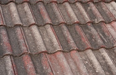 Brown old and aged building clay roof texture isolated on full frame horizontal ratio background.