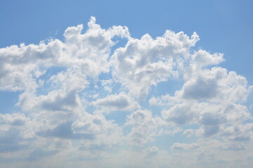 White clouds in blue sky at sunny day