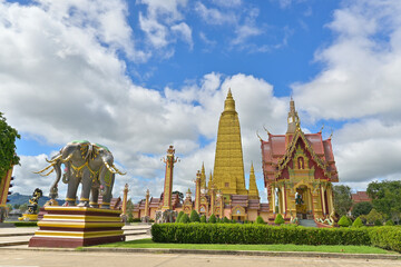 Wat Mahathat Wachiramongkhon or Wat Bang Thong, Krabi Province, Thailand. Beautiful scenery with exterior architecture of buddhist temple under cloudy blue sky during summer.