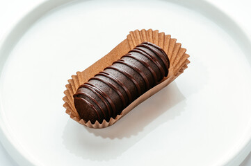 dessert in a clear glass with berries, cream and chocolate