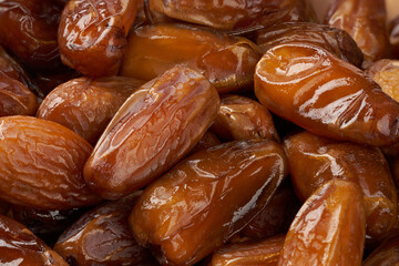 closeup pile of dry date palm fruit food texture background
