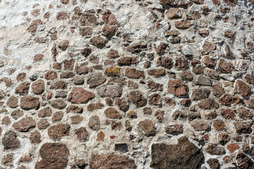 Texture of an old antique stone wall. Background for design.