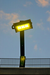 bright luminaire against the evening sky