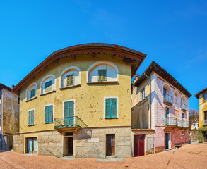 The colored townhouses of Piazza Montaa, Carona, Ticino, Switzerland