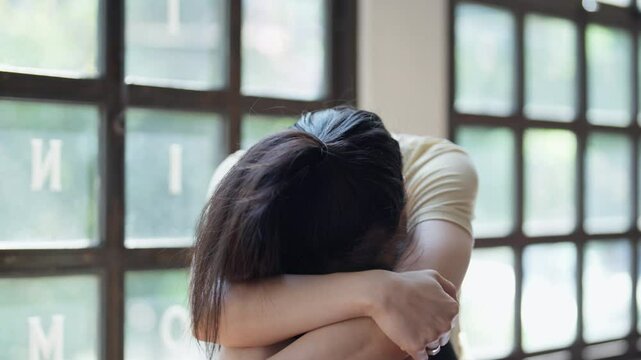 Stressful Asian woman sad of dieting Weight loss fail