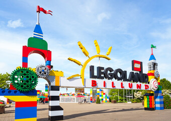 Naklejka premium Billund, Denmark - July 14, 2024: Entrance gate of the original Legoland park, opened in 1968, first of a chain of family amusement parks focusing on the Lego building toy brand.