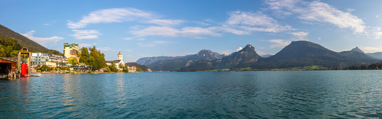 Naklejka premium landscape with Lake Wolfgangsee, mountains and the town of Sankt Wolfgang, Austria