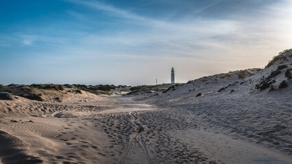 faro de trafalgar en cla costa de Cadiz durante la puesta de Sol