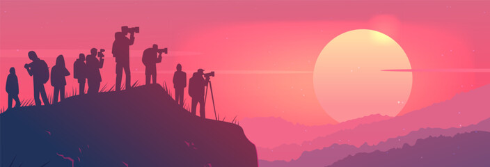 Naklejka premium Photographers capturing sunset on hill silhouettes scenic landscape pink sky large sun mountains nature community