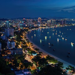 Fototapeta premium A panoramic view of Pattaya city at night, with its vibrant lights reflecting off the ocean, capturing the energy of the bustling streets.