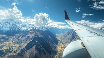 Fototapeta premium An aircraft ascending into the sky with the stunning Andean landscape in the background, viewed from behind.