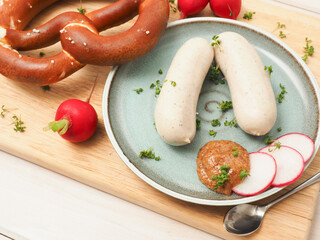 Bavarian veal sausage with sweet mustard and pretzel