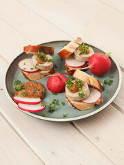 White sausage with sweet mustard and pretzel served as finger food