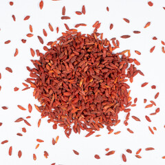 Dried Goji berries Lycium barbarum top view on a white background