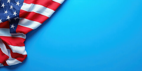 Obraz premium The american flag against a blue background, symbolizing national pride and freedom, perfect for patriotic events. Banner. Flat lay, top view. Copy space. Mock up.