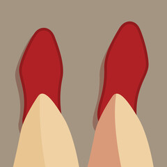 Fototapeta premium Pair of legs with red shoes is approaching the viewer from a top down perspective