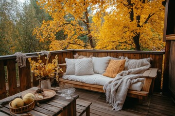 Obraz premium Cozy Autumn Retreat on Wooden Porch that is Beautifully Surrounded by Golden Foliage. Wooden terrace