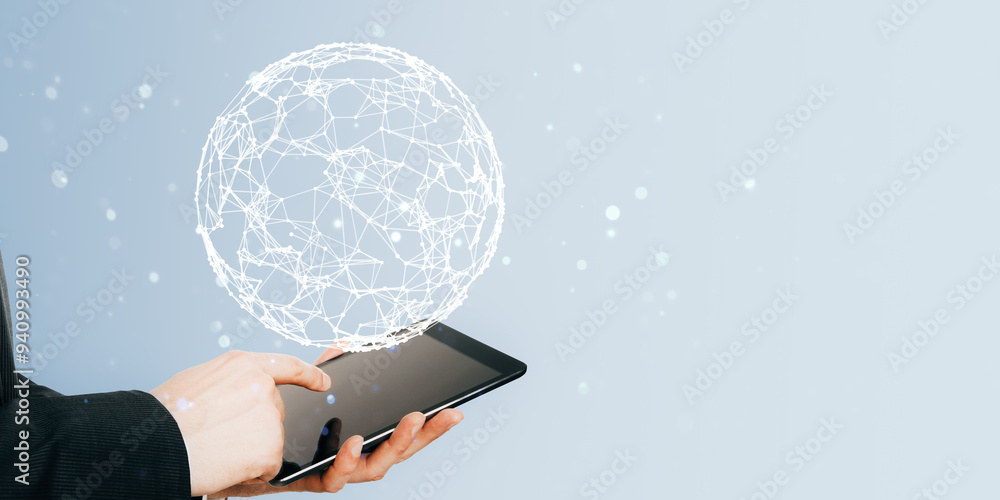 Poster close up of male hand using tablet with glowing polygonal sphere hologram on white background with m