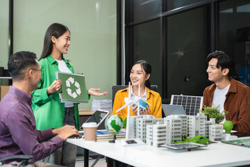 Engineer Teamwork Meeting, with partner on model building at company office working technology, Renewable energy-based green businesses and global warming.