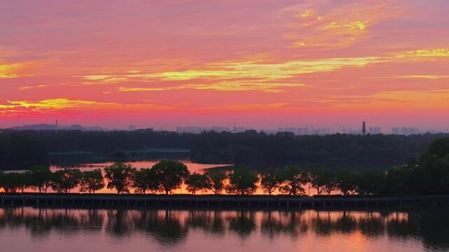 Summer sunrise scenery of Wuhan East Lake Scenic Area
