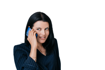 Purposeful brunette American woman talks by phone toothy smiles looks away standing indoors against transparent background with copy space, mockup. Businesswoman chatting.