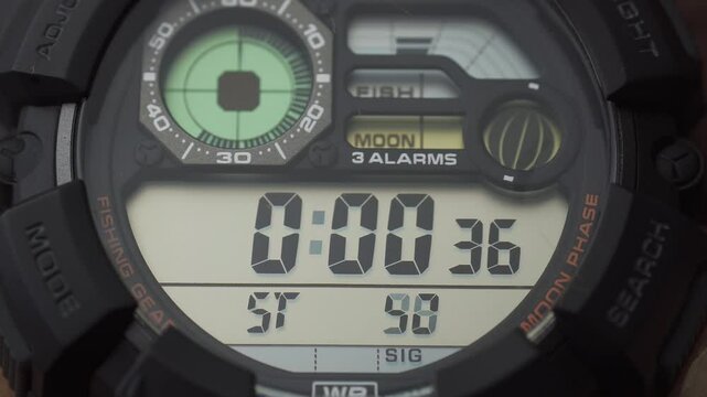 LCD display of a tough sports watch with running timer and stopwatch 
