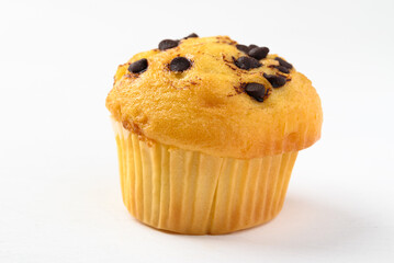 Vanilla chocolate chips muffin on white background