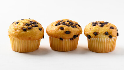 Vanilla chocolate chips muffin on white background