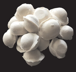 white mushrooms on black background