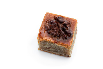 Homemade walnuts and honey baklava isolated on white