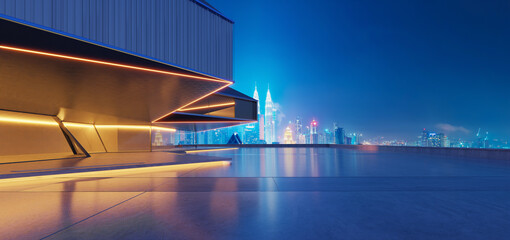 Perspective view of empty concrete floor with city skyline and urban skyscrapers at night © jamesteohart