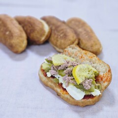 Fricasse with Tuna, Pickled Lemon, Hard-Boiled Egg, Harissa, Olives, and Pickles – פריקסה Tunisian Treat
