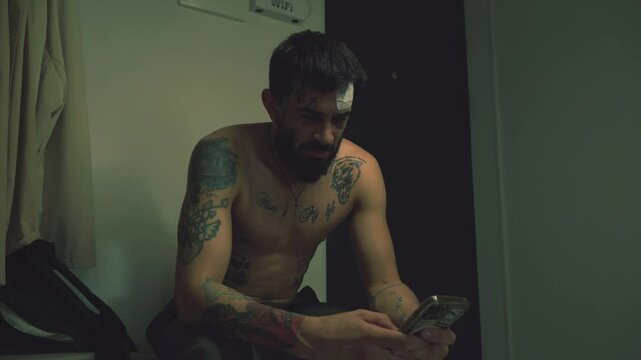  Man is looking at the phone