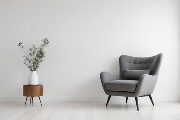 Gray Armchair with Pillow and Plant in a White Room