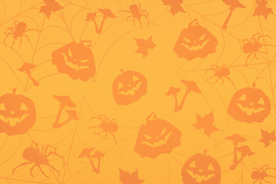 Wallpaper. Pattern. Jack-o'-lanterns and spiders silhouettes weave together in orange haze. Mood for creepy Halloween. Concept of mystery, fantastic, spooky vibe. Backgrounds.