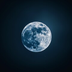 Fototapeta premium A clear view of the full moon against a dark background.