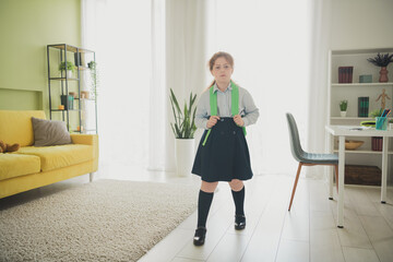 Photo of sad upset frustarted adorable girl school kid dont want going school in morning standing room home indoors